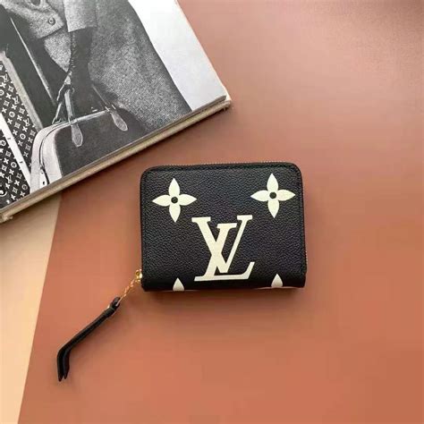 lv zippy coin purse monogram empreinte|louis vuitton embossed purses.